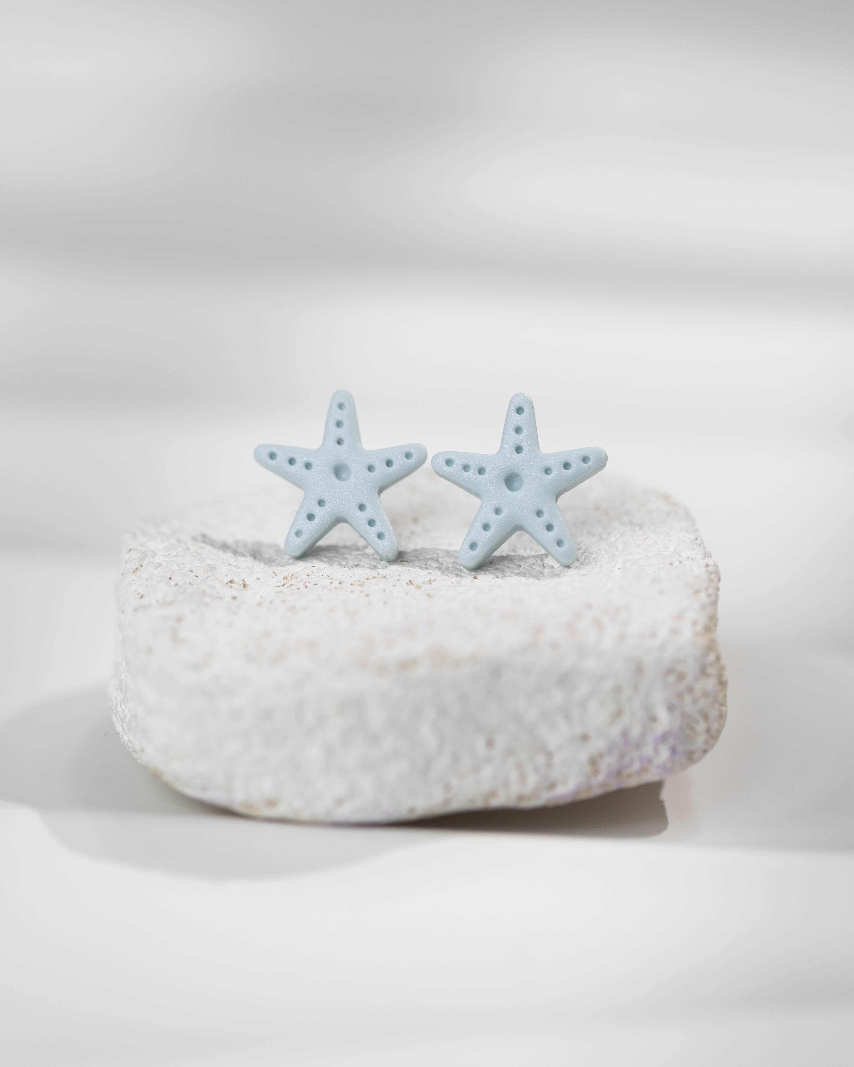 Cercei Studs Starfish - pearl blue
